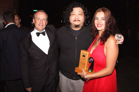 Second Prize Winner in the Digital Accordion Competition Larysa Bodell with her father Raymond Bodell and Chinese Delegate Chen Jun,