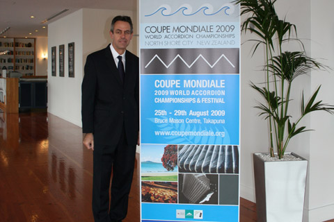 Kevin Friedrich with the Coupe Mondiale banner