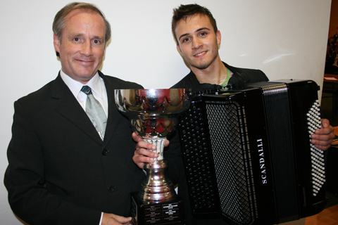 CIA President Raymond Bodell (United Kingdom) with 63rd Coupe Mondiale Champion Petar Maric, Serbia 